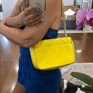 Victoria’s Secret yellow purse chain strap can be shoulder or crossbody EUC